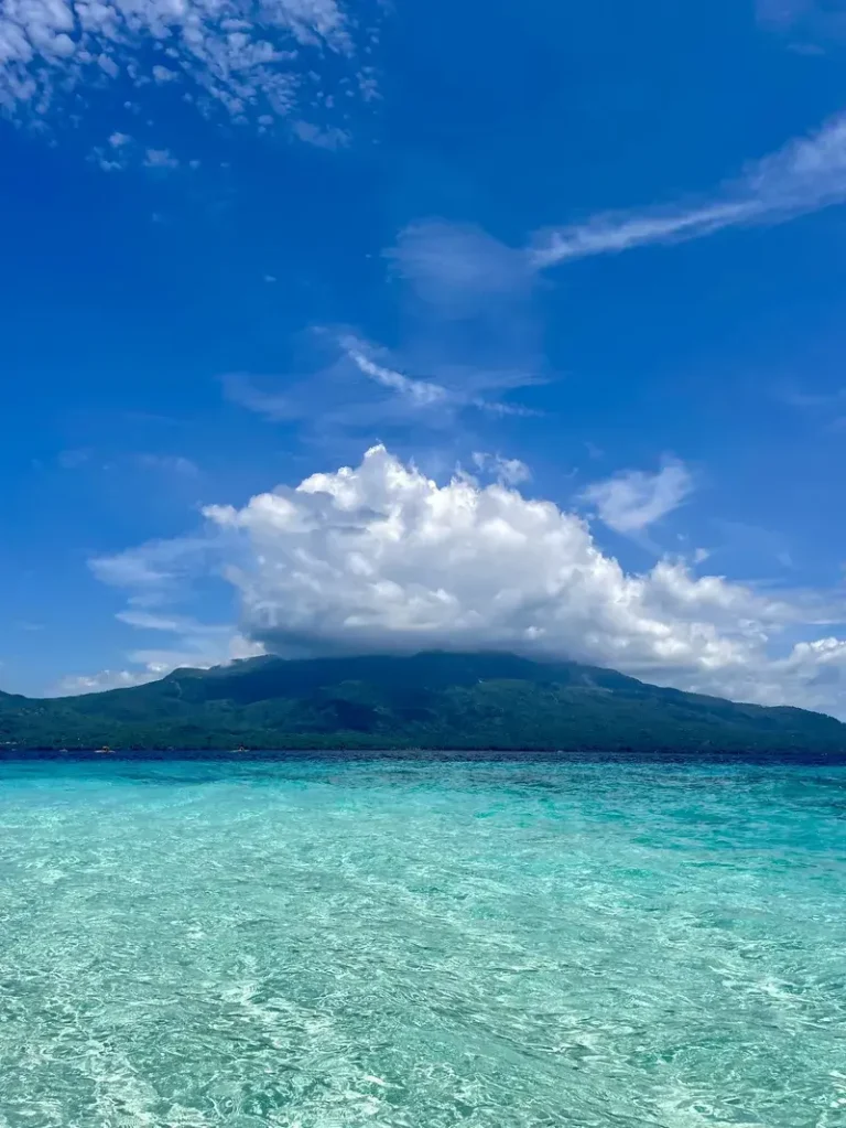 Mount Vulcan captured in Mantigue Island surrounded by turquoise water