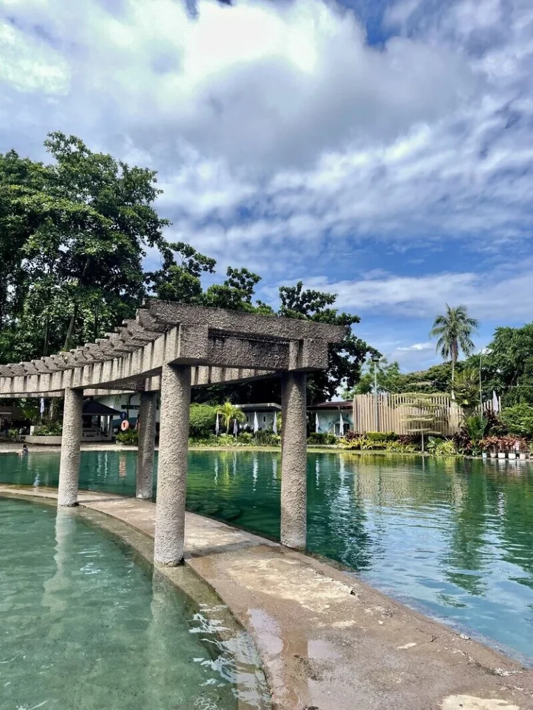 Beautiful photo of Bura soda water pool in camiguin captured underneath the sky