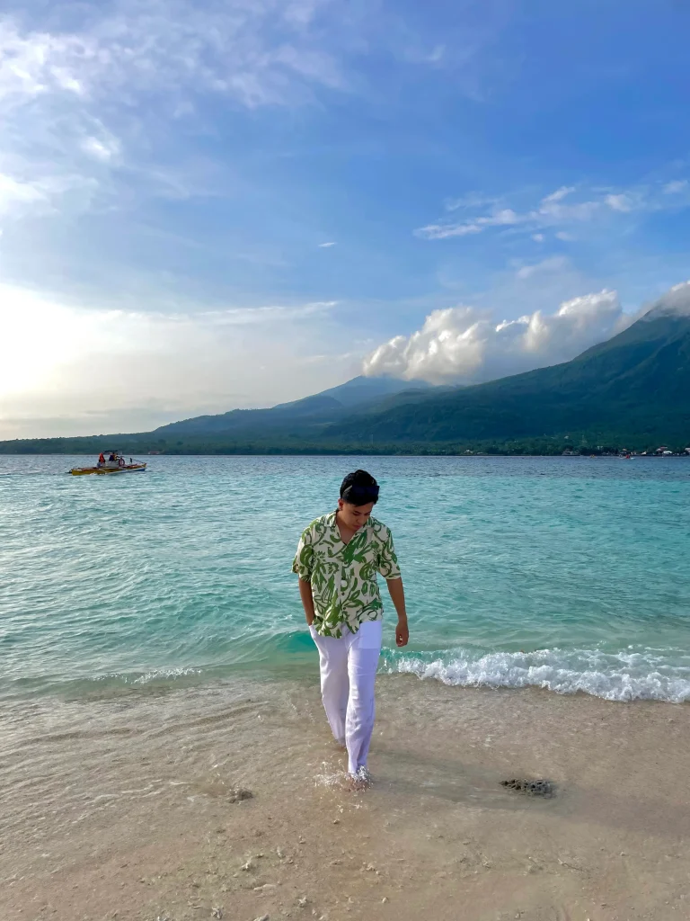 Man walking on White island in Camiguin Island