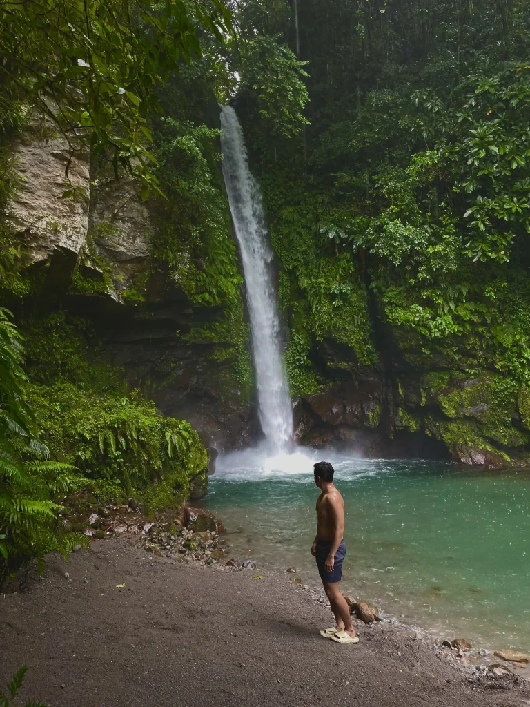 Man doing side view pose at Tuasan Falls