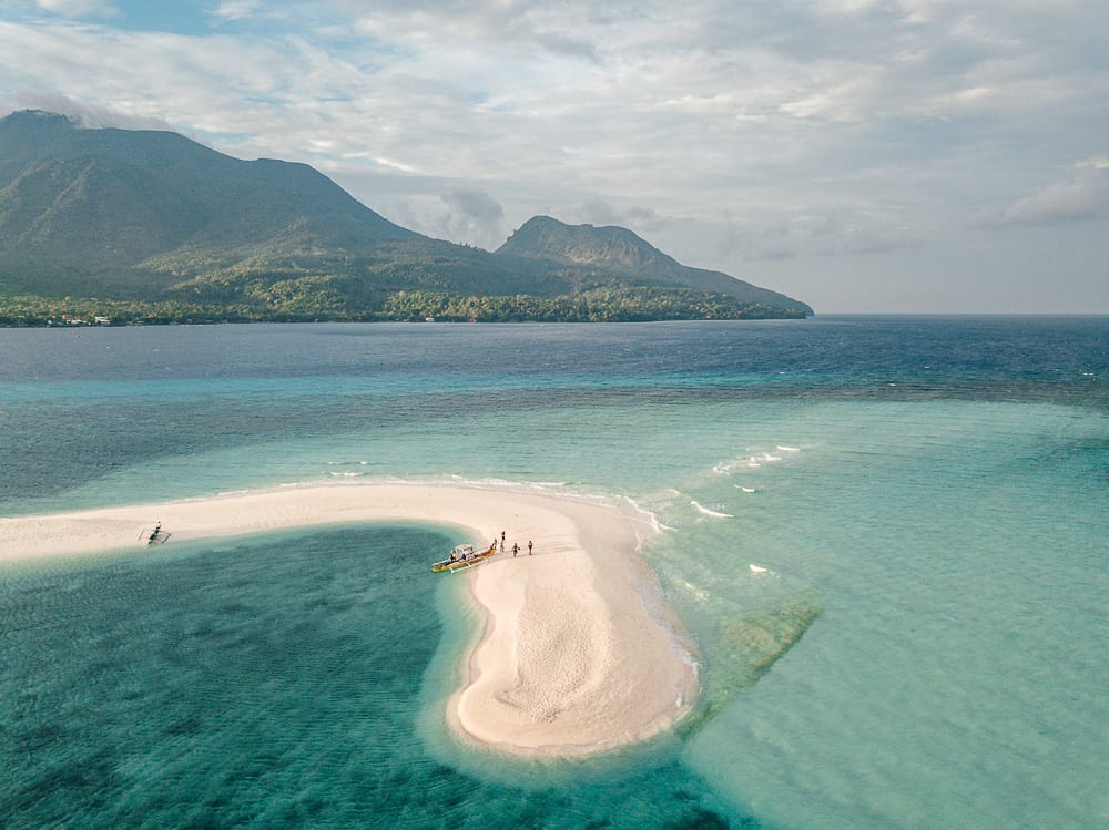 Drone shot of White Island in Camiguin showing Mount Hibok-Hibok in the back