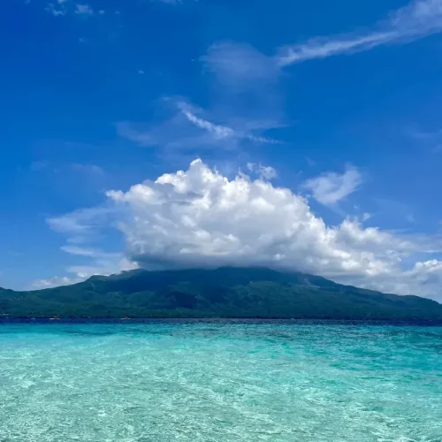 Mount Vulcan captured in Mantigue Island surrounded by turquoise water