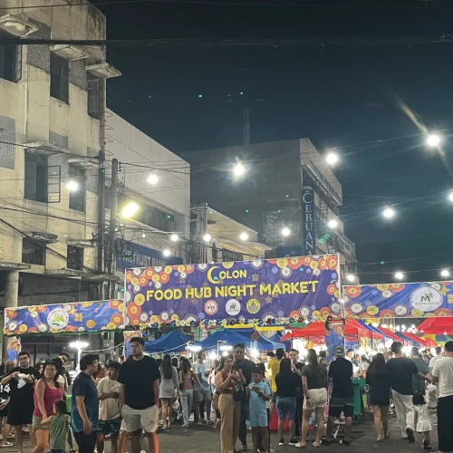 Colon night market in Cebu City packed with crowds underneath the Colon Food Hub Night Market sign